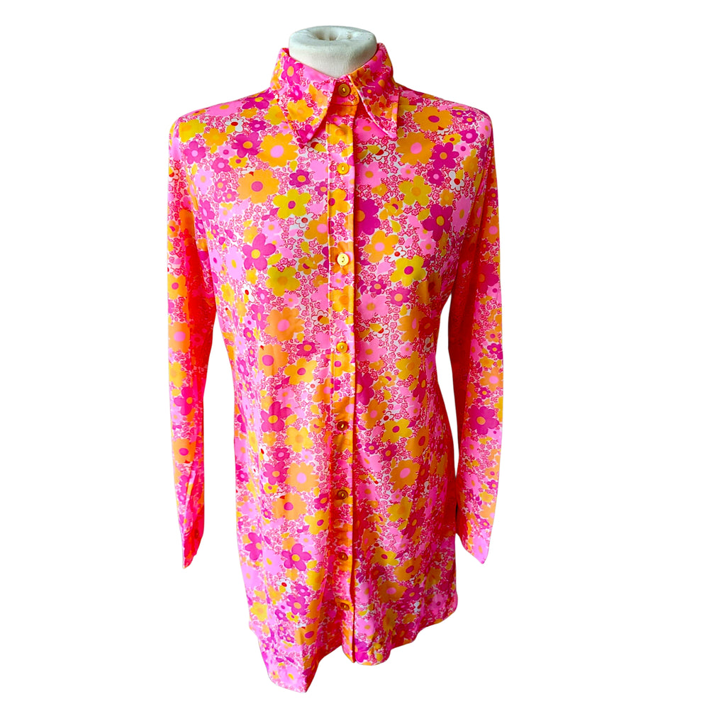 Retro mod mini dress featuring pink orange and yellow daisy print