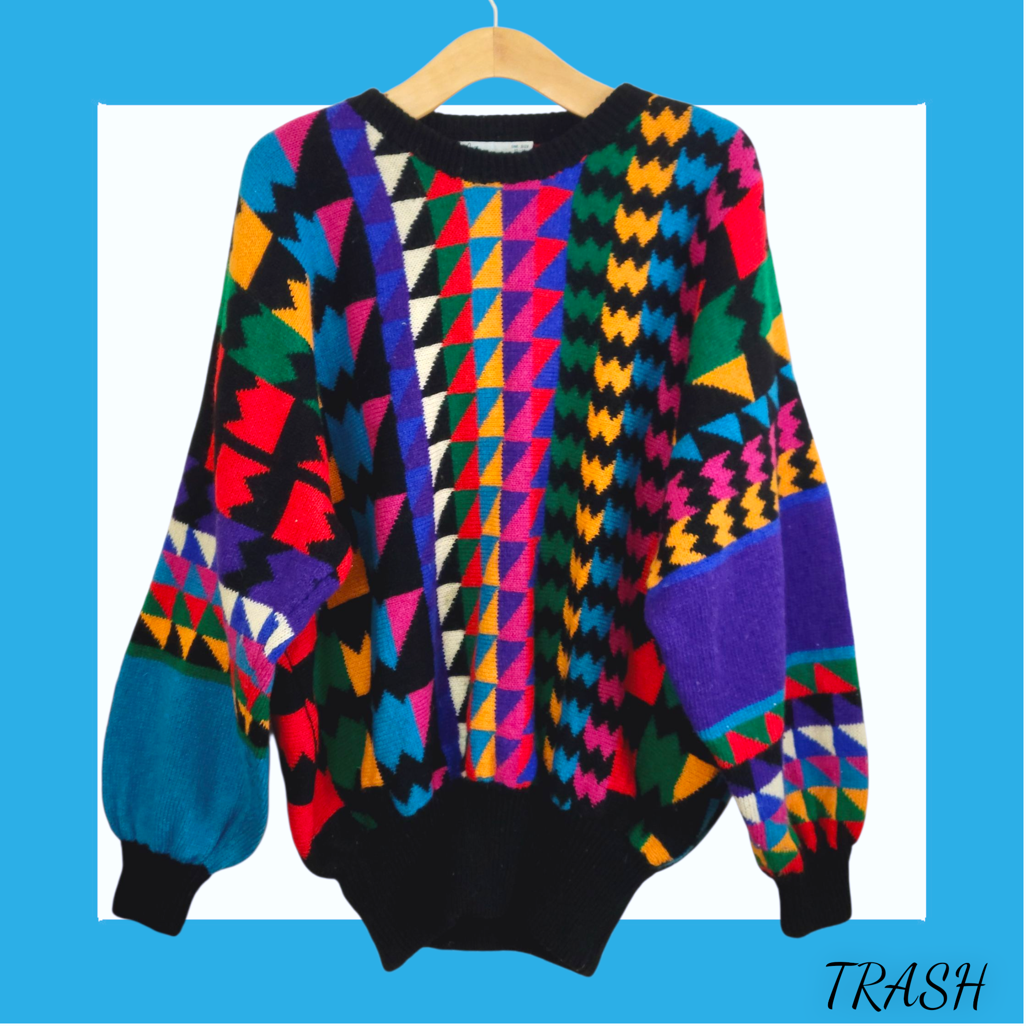 Funky vintage rainbow sweater with colourful geometric pattern. Buy online fromTrash Vintage UK