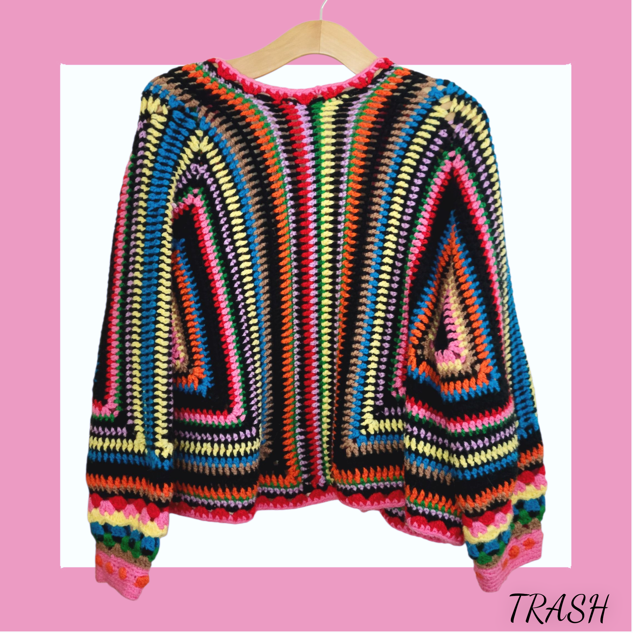 Back view of Unique handmade boho cardigan jacket with rainbow knit design