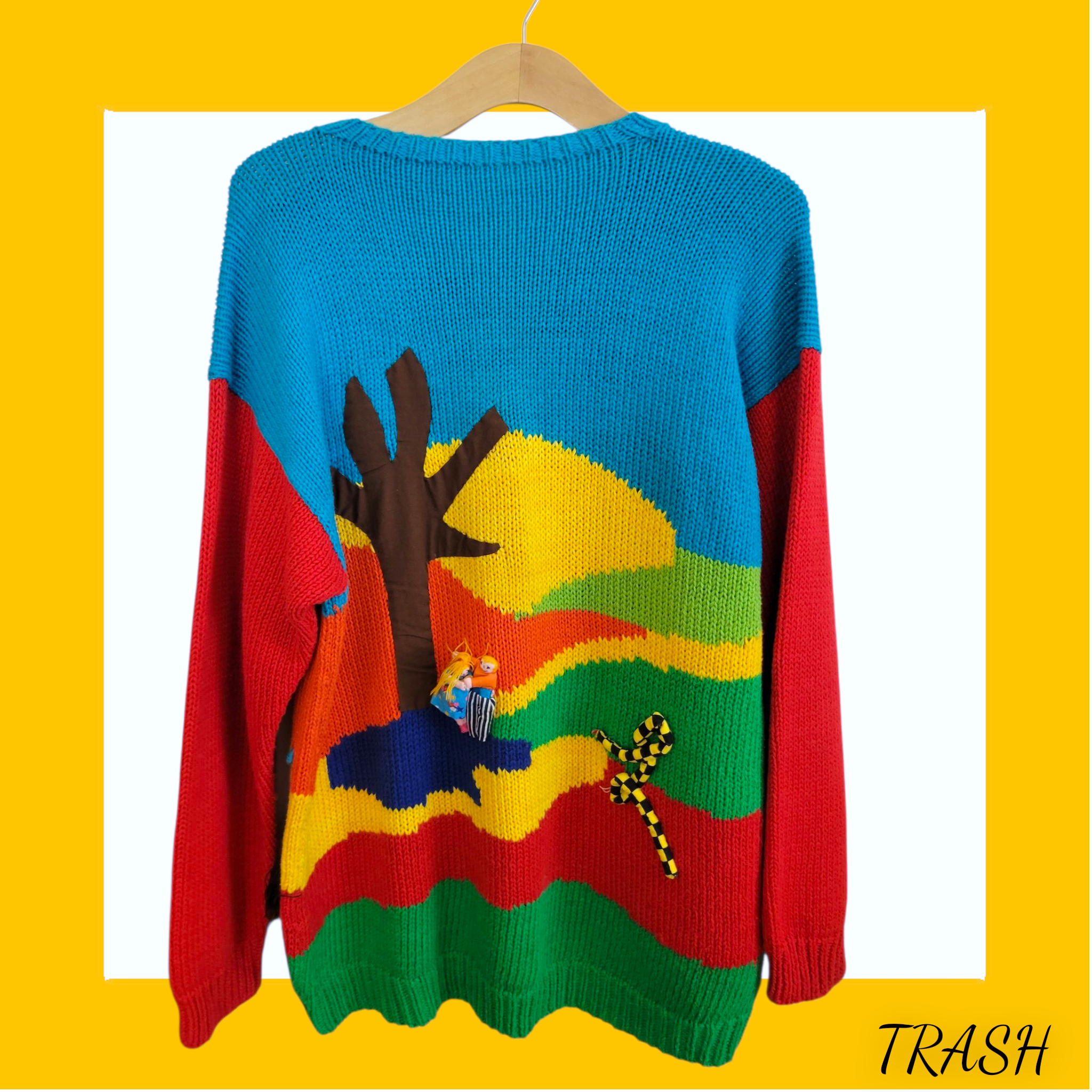 Back view of Retro multicolour ugly jumper with embroidered biblical scene and yarn accents