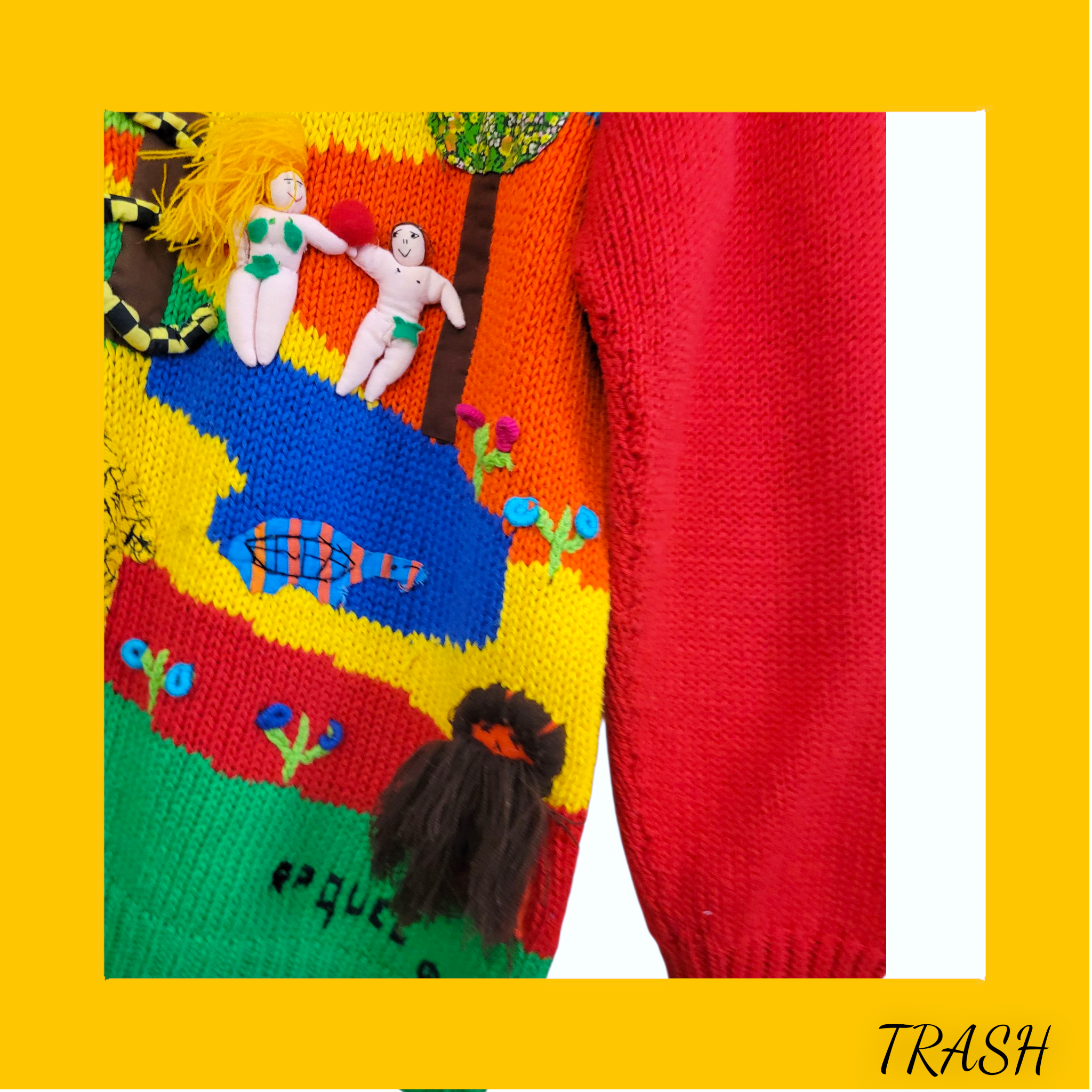 Colorful knitted garment with abstract design on a yellow background