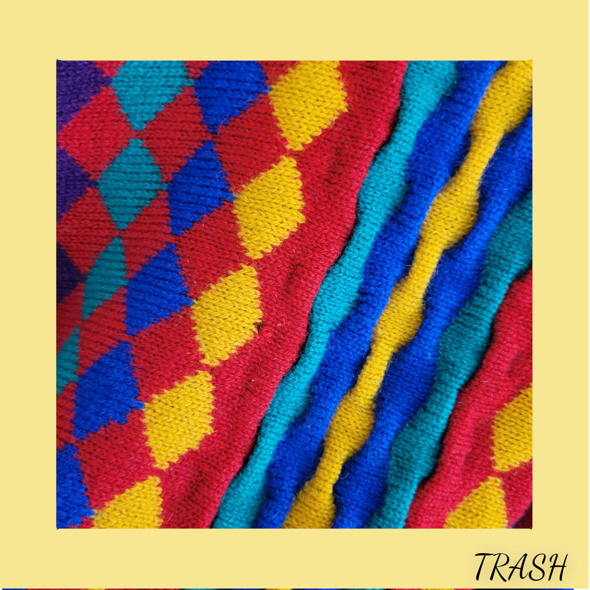 Bold multicoloured harlequin patterned sweater vintage 80s 90s knitwear- close up 