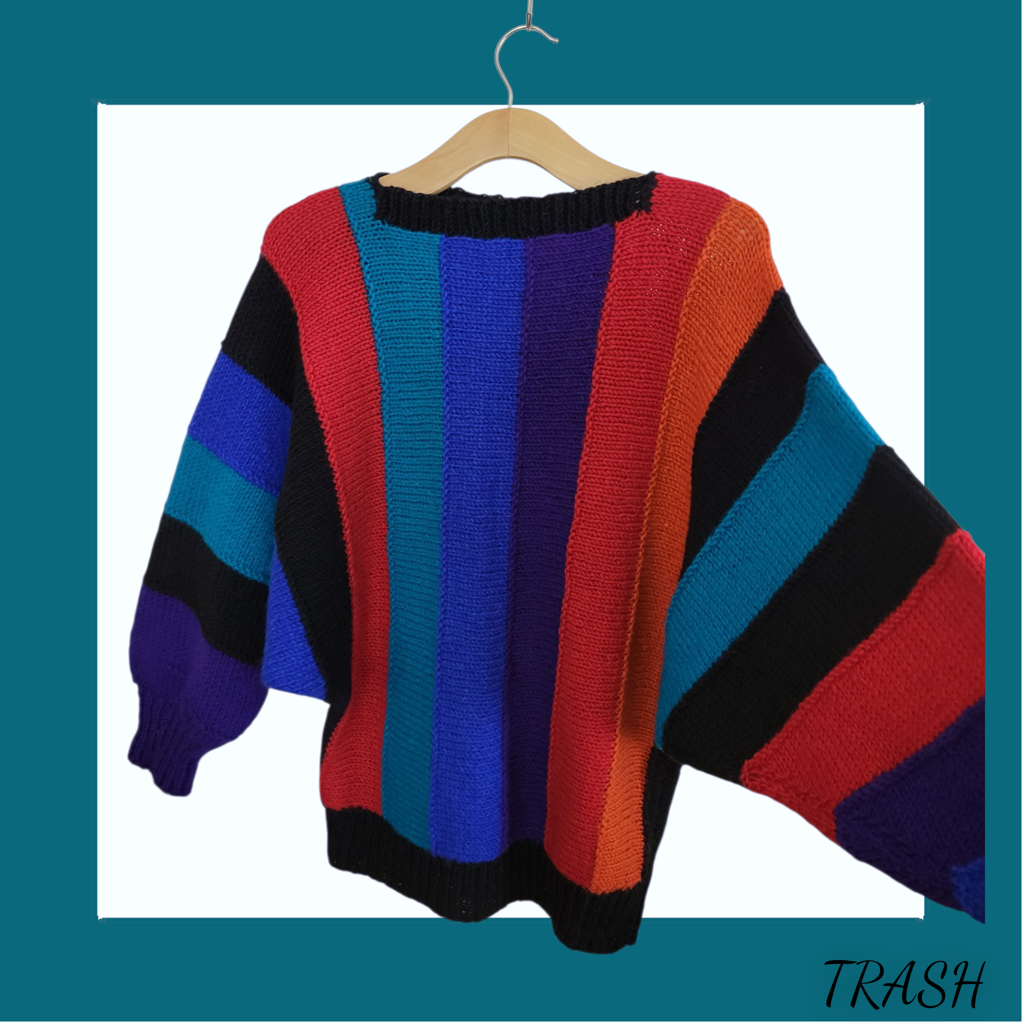 Bold rainbow stripe vintage 90s chunky knit jumper oversized- side view.