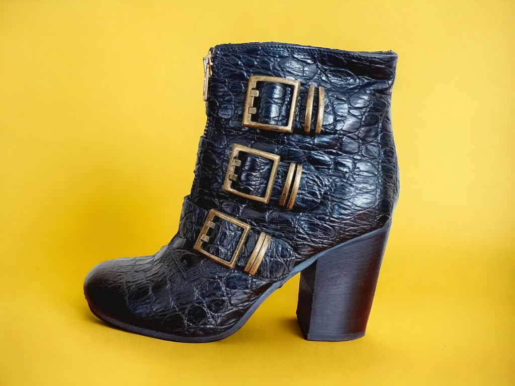 Early 2000s retro Y2K snakeskin print Sisley black ankle boots with bronze buckles and zip closure, women’s size UK 6 EU 39